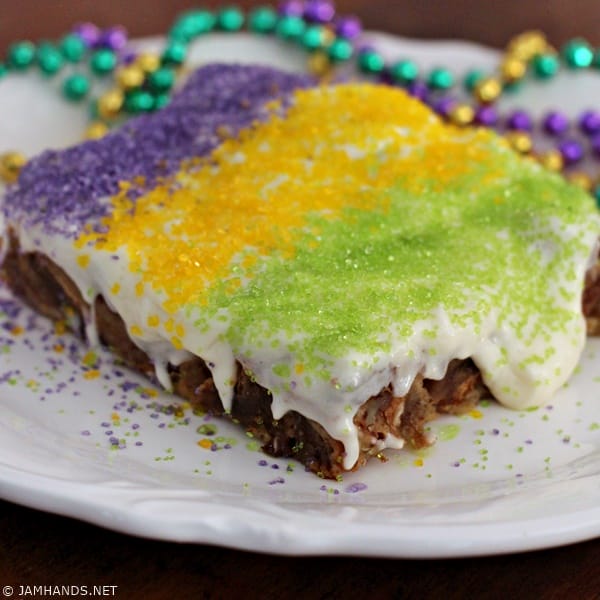 King Cake Bread Pudding with Bourbon Cream Cheese Frosting
