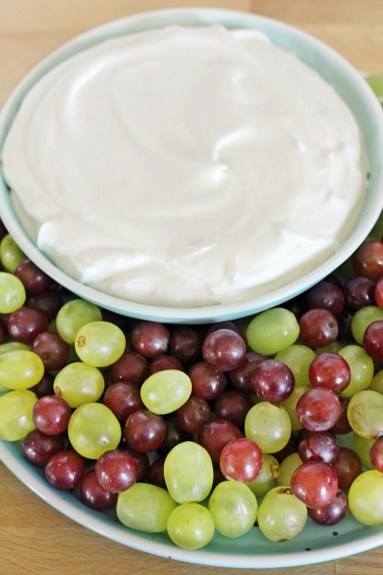 2 Ingredient Caramel Apple Fruit Dip served with green and red grapes