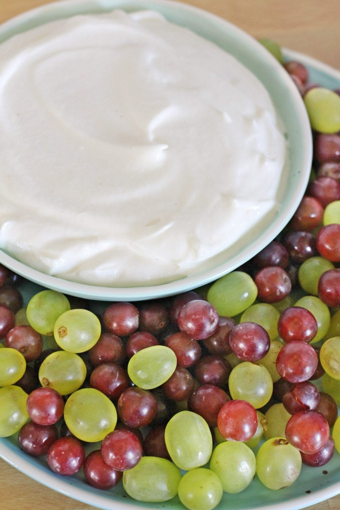 2 Ingredient Caramel Apple Fruit Dip served with green and red grapes