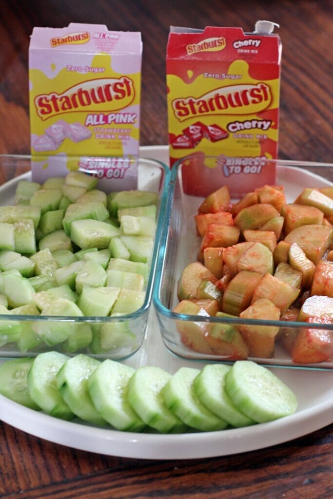 Prepared Sugar-Free Tiktok Starburst cucumbers, flavored strawberry and cherry, in glass storage dishes.