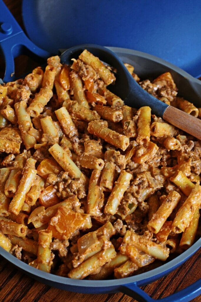 Closeup of Creamy Taco Hamburger Helper. This recipe features ziti noodles tossed with seasoned ground beef, creamy salsa-infused sauce, and melted cheese.